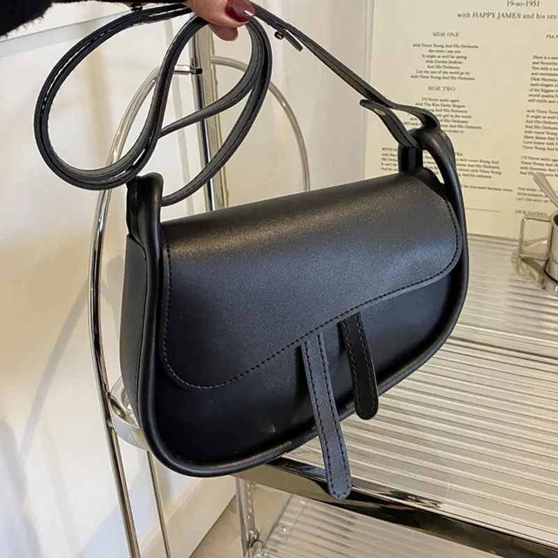 Casual Solid PU Leather Shoulder Crossbody Saddle Bag For Women 2022 Women's Designer Small Flap Handbag Trend Female Armpit Bag
Casual Solid PU Leather Shoulder Crossbody Saddle Bag For Women 2022 Women's Designer Small Flap Handbag Trend Female Armpit Bag
