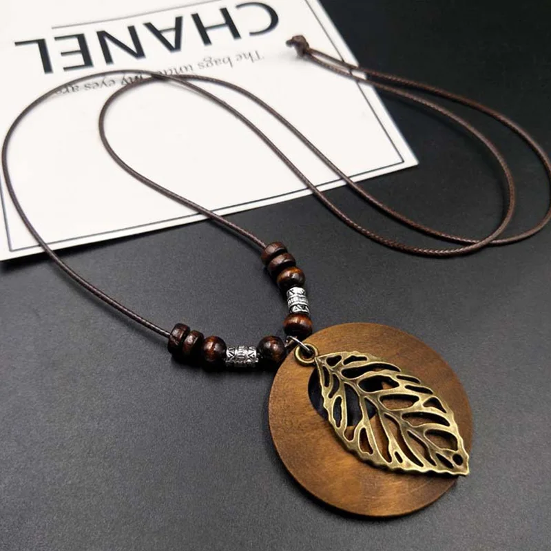 Vintage Wooden Owl Leaf Pendant Necklaces Boho Ethnic Style Metal Hollow Leaves Necklaces Long Wax Rope Chain For Women Gifts
Vintage Wooden Owl Leaf Pendant Necklaces Boho Ethnic Style Metal Hollow Leaves Necklaces Long Wax Rope Chain For Women Gifts