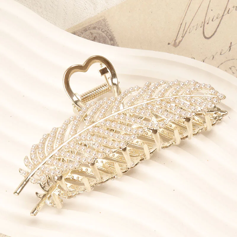 Hair Claws Clips feather shape with full pearls Strong Hold Prevent Slip Decorative Hair Styling Clamp KC gold
Hair Claws Clips feather shape with full pearls Strong Hold Prevent Slip Decorative Hair Styling Clamp KC gold