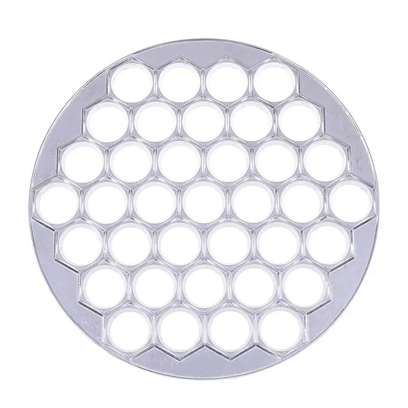 1pc Alloy Dumpling Maker Ravioli Making Mold With 37 Holes Wonton Wrapper Cutters Pelmeni Mould Kitchen Tool (Silver)
1pc Alloy Dumpling Maker Ravioli Making Mold With 37 Holes Wonton Wrapper Cutters Pelmeni Mould Kitchen Tool (Silver)