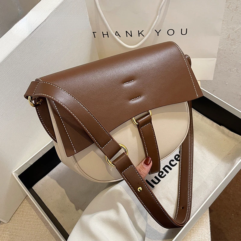 2023 New Quality PU Leather Women's Designer Handbag Contrast Color Saddle Bag Armpit Bag Luxury Brand Shoulder Messenger Bag
2023 New Quality PU Leather Women's Designer Handbag Contrast Color Saddle Bag Armpit Bag Luxury Brand Shoulder Messenger Bag