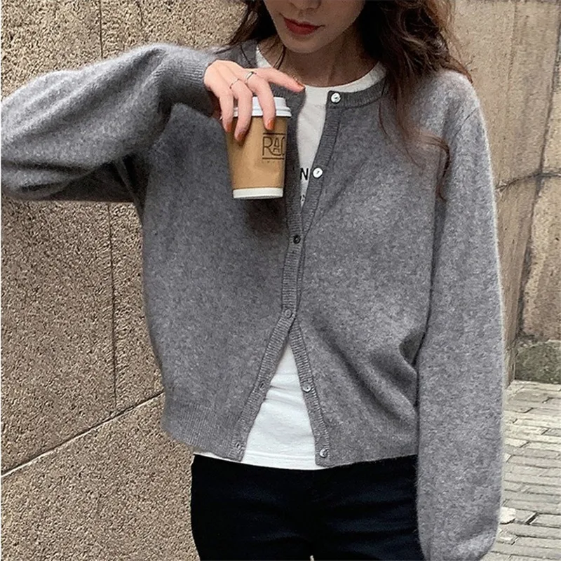 Sweater women's new solid color cardigan jacket women's soft glutinous short knit top
Sweater women's new solid color cardigan jacket women's soft glutinous short knit top