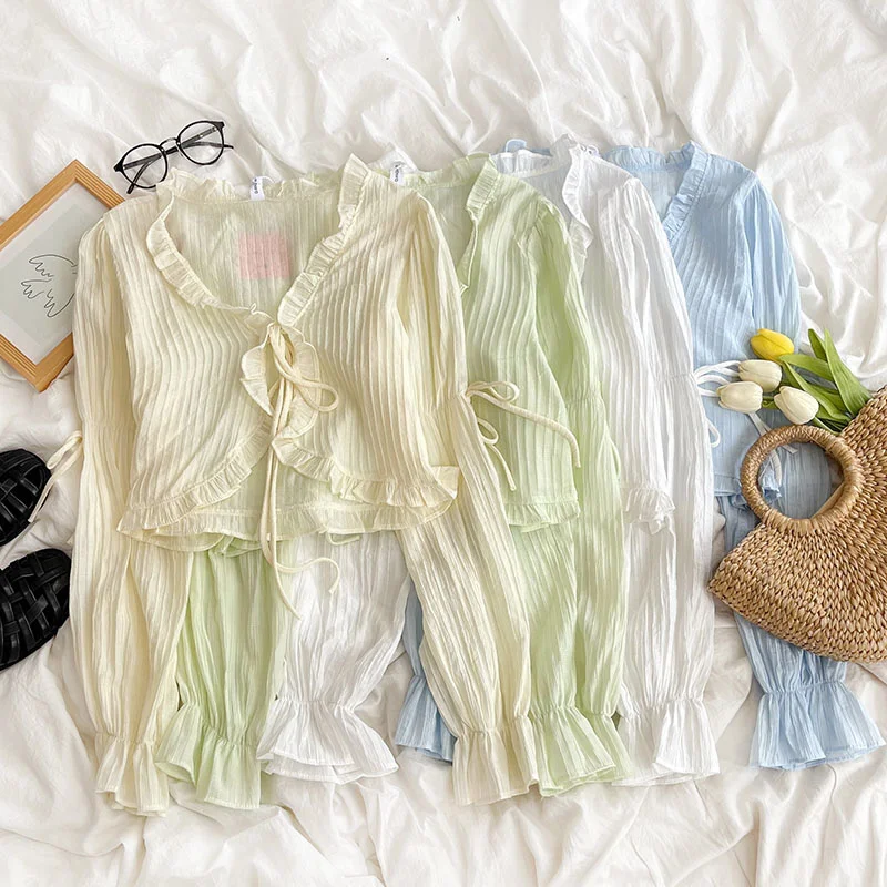 Summer sweet and fresh solid color fungus edge tie V-neck textured thin long-sleeved sunscreen cardigan
Summer sweet and fresh solid color fungus edge tie V-neck textured thin long-sleeved sunscreen cardigan