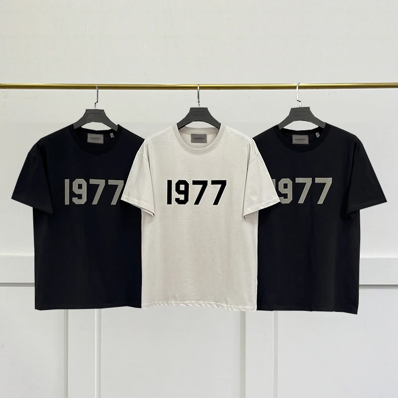 SS22 New Chest Number 1977 Short Sleeve Unisex Loose High Street Brand ESSENTIALS TRIP Men and Women T-Shirt
SS22 New Chest Number 1977 Short Sleeve Unisex Loose High Street Brand ESSENTIALS TRIP Men and Women T-Shirt