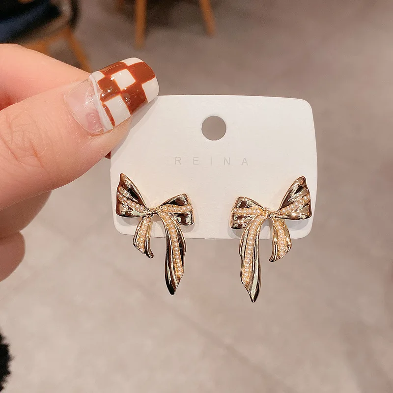925 silver needle delicate and flexible bow earrings temperament sweet metal style niche earrings fairy earrings
925 silver needle delicate and flexible bow earrings temperament sweet metal style niche earrings fairy earrings