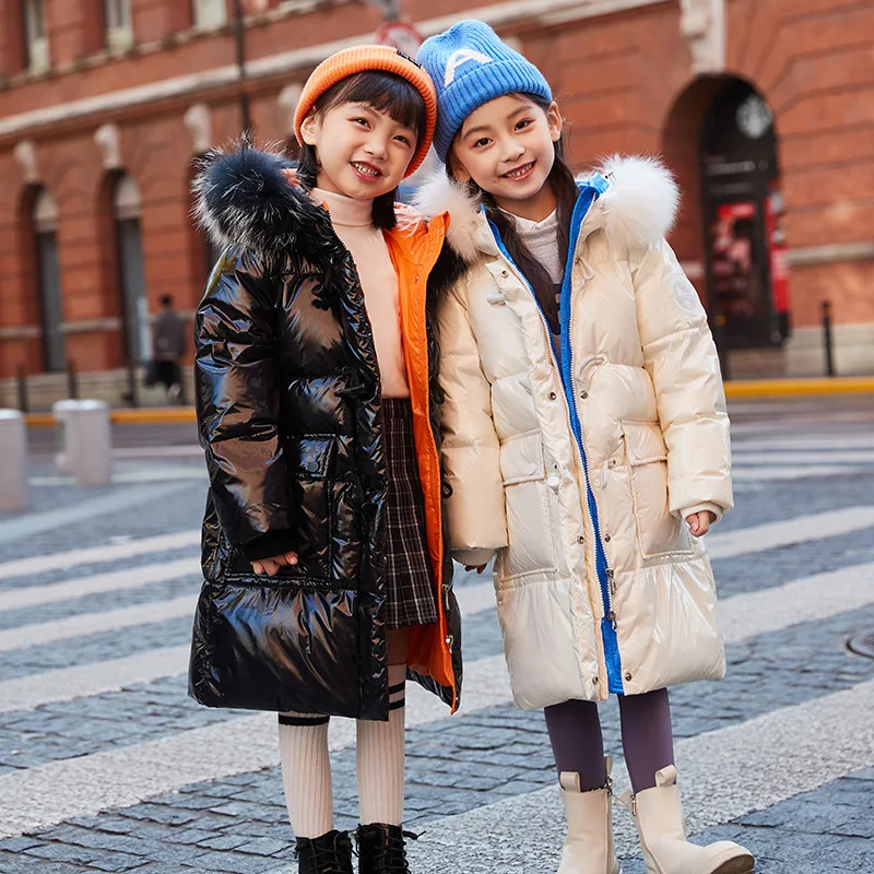 Girls' new warm down jacket Winter children's hooded windproof thick coat Middle school children go out in cold-proof clothing
Girls' new warm down jacket Winter children's hooded windproof thick coat Middle school children go out in cold-proof clothing