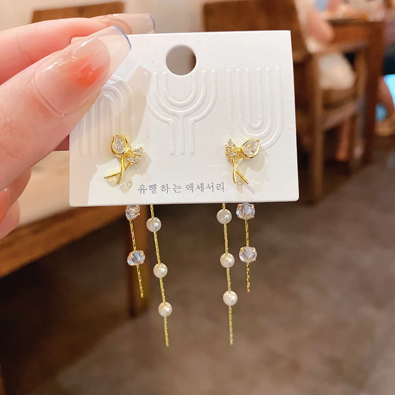 Real Gold Plating Silver Needle Zircon Tulip Flower Pearl Tassel Earrings Small Fresh Sweet Versatile
Real Gold Plating Silver Needle Zircon Tulip Flower Pearl Tassel Earrings Small Fresh Sweet Versatile