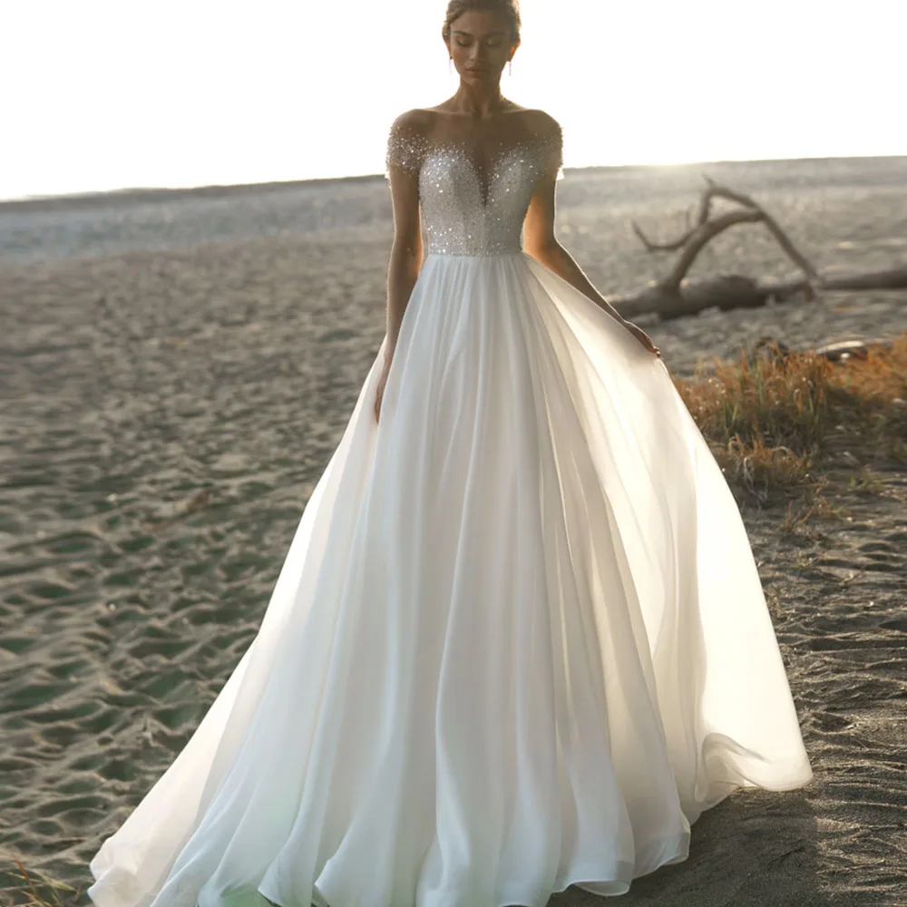 Classic Bride Gowns O-Neck Short Sleeves Zipper Illusion Backless Wedding Dresses Chiffon A-Line Floor Length Vestido De Noiva
Classic Bride Gowns O-Neck Short Sleeves Zipper Illusion Backless Wedding Dresses Chiffon A-Line Floor Length Vestido De Noiva