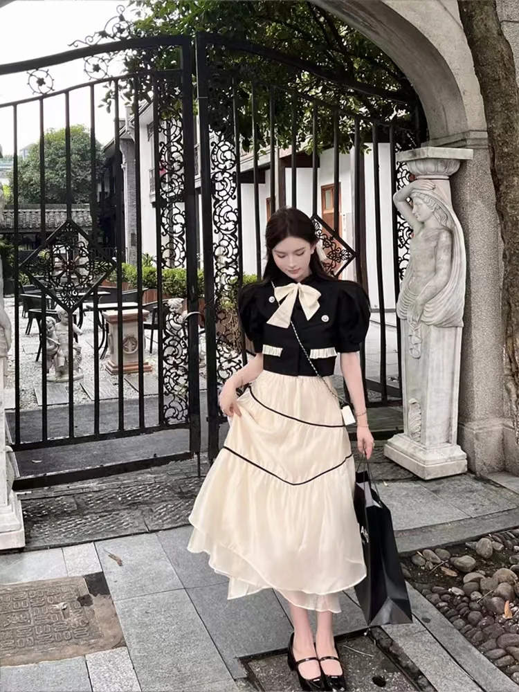 2023 spring and summer women's clothing fashion new Lapel Wooden Ear Color Contrast Patchwork Top➕Mid-Length Skirt Suit 0511
2023 spring and summer women's clothing fashion new Lapel Wooden Ear Color Contrast Patchwork Top➕Mid-Length Skirt Suit 0511