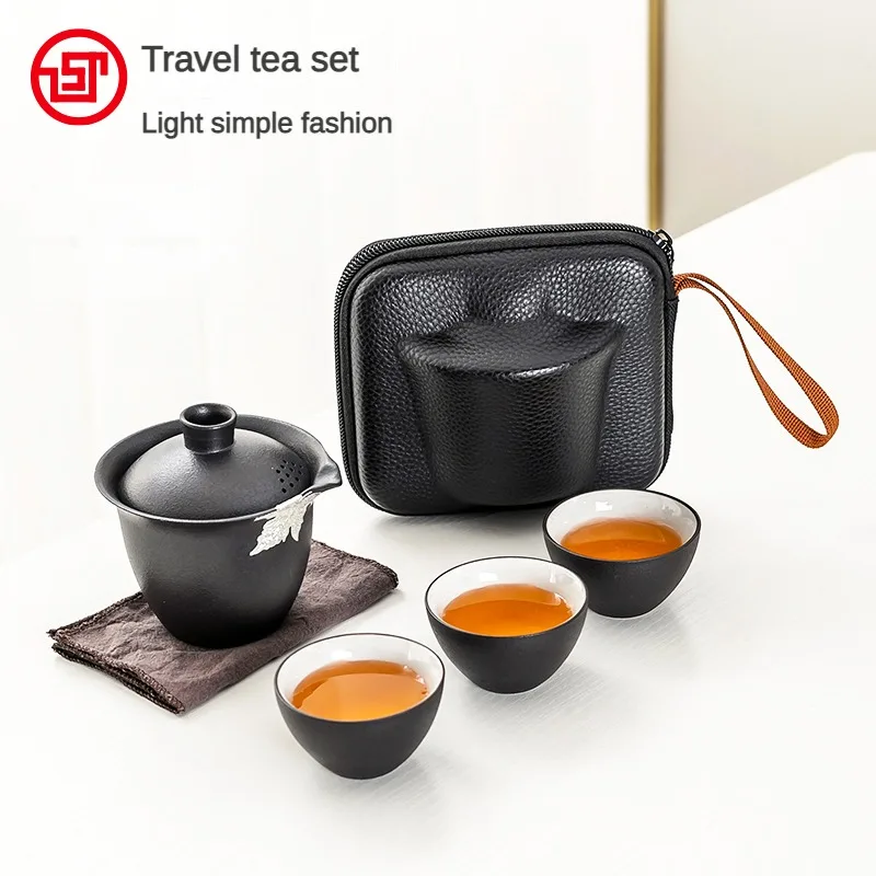 Black Pottery Cup Travel Tea Set Small Business Trip Simple Outdoor Portable One Pot Three Cups Carry-on Teapot Camping Supplies
Black Pottery Cup Travel Tea Set Small Business Trip Simple Outdoor Portable One Pot Three Cups Carry-on Teapot Camping Supplies