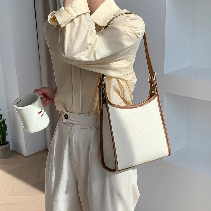 Women Leather Patchwork Handbags New Fashion Solid Color Shoulder Shopping Canvas Bag Simple Casual Office Lady Handbag 2022
Women Leather Patchwork Handbags New Fashion Solid Color Shoulder Shopping Canvas Bag Simple Casual Office Lady Handbag 2022