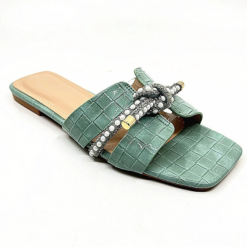 2022 Women Summer Shoe Trendy Pearl Vacation Seaside Ladies Slides New Flat Bottom Female Flip Flops Designer Woman Slides
2022 Women Summer Shoe Trendy Pearl Vacation Seaside Ladies Slides New Flat Bottom Female Flip Flops Designer Woman Slides