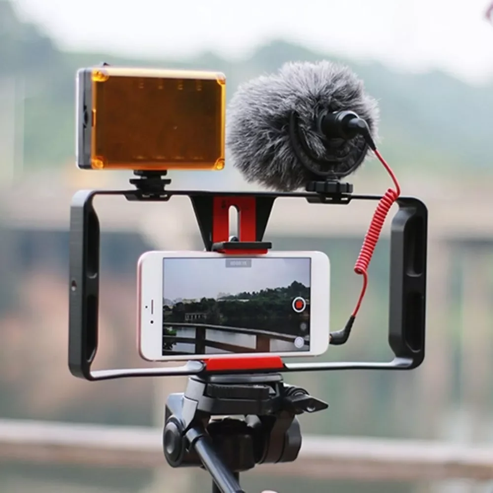 Video Camera Cage Stabilizer Film Making Rig For Smart Phone Video Rig Mobile Phone Holder Hand Grip Bracket Holder Stabilizer
Video Camera Cage Stabilizer Film Making Rig For Smart Phone Video Rig Mobile Phone Holder Hand Grip Bracket Holder Stabilizer