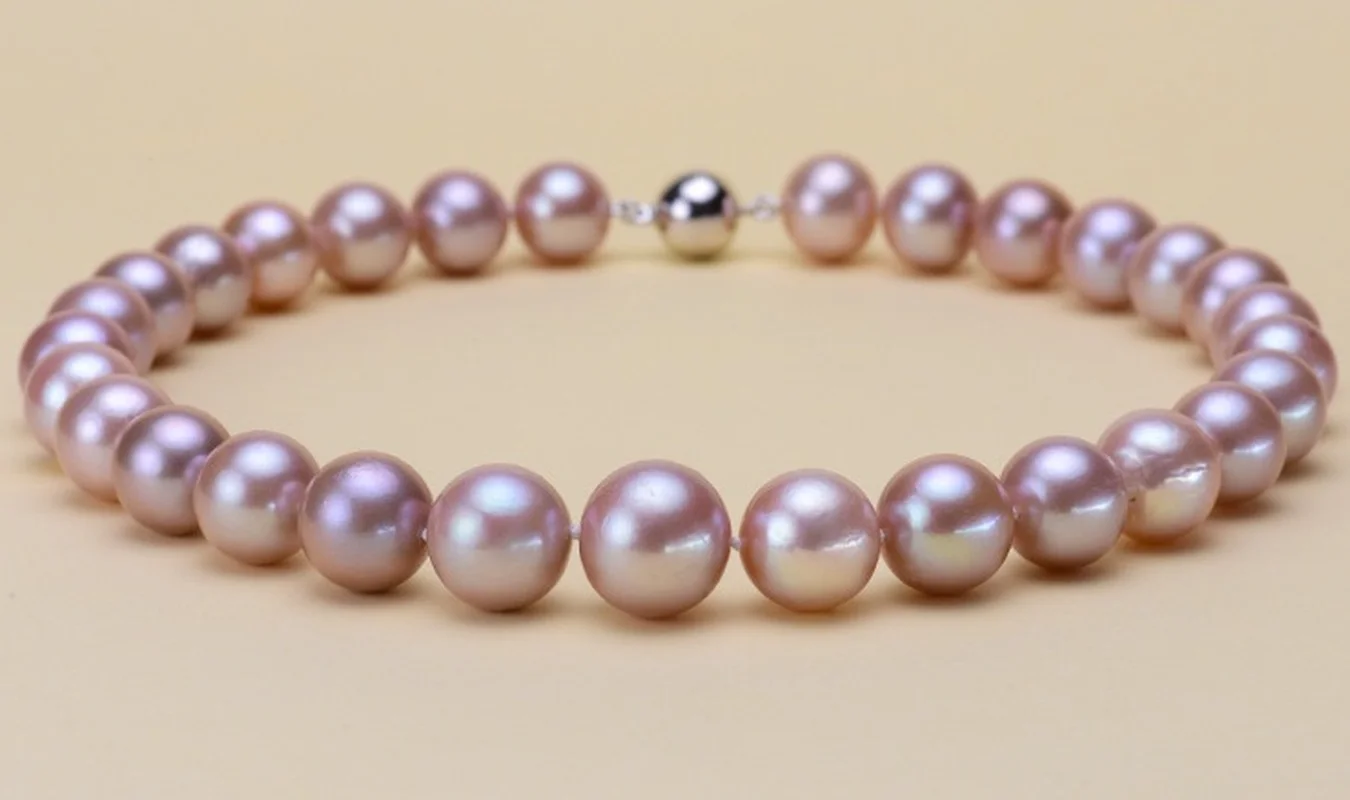 Huge charming 18"11-12mm natural south sea genuine purple lavender round necklace free shipping women jewelry
Huge charming 18"11-12mm natural south sea genuine purple lavender round necklace free shipping women jewelry