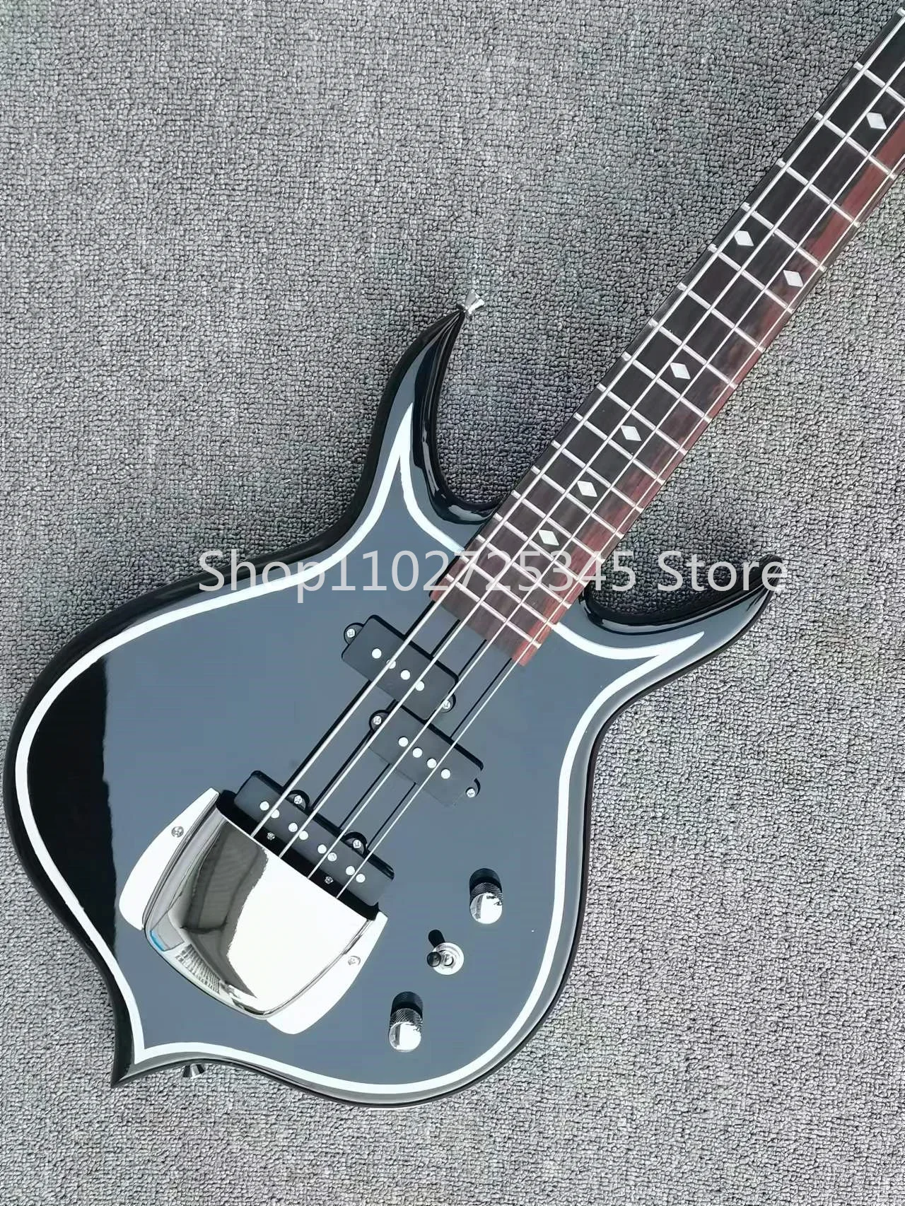 4-string bass guitar, rosewood fingerboard, fixed bridge, silver accessories, seller to bear shipping costs
4-string bass guitar, rosewood fingerboard, fixed bridge, silver accessories, seller to bear shipping costs