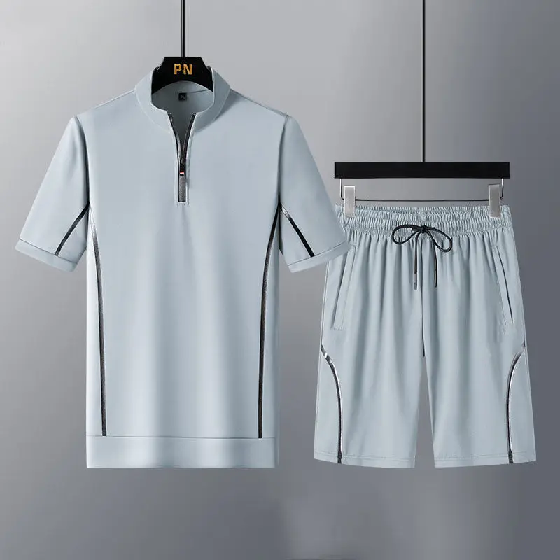 New Summer men's sportswear suit man fitness suit sports suit short-sleeved T-shirt + shorts quick-drying 2-piece male clothing
New Summer men's sportswear suit man fitness suit sports suit short-sleeved T-shirt + shorts quick-drying 2-piece male clothing