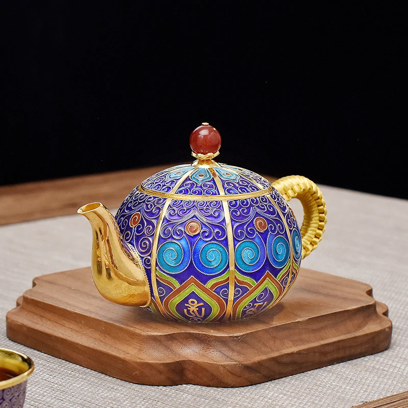 Cloisonne sterling silver 999 teapot gold-plated point blue cloisonné enamel color boutique silver tea set silver pot 225ml
Cloisonne sterling silver 999 teapot gold-plated point blue cloisonné enamel color boutique silver tea set silver pot 225ml