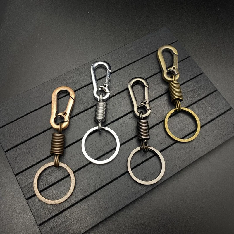 Spring Keychain Climbing Hook Simple Strong Carabiner Shape Keychain Anti-rust Buckle Hanging Retractable Keychain
Spring Keychain Climbing Hook Simple Strong Carabiner Shape Keychain Anti-rust Buckle Hanging Retractable Keychain