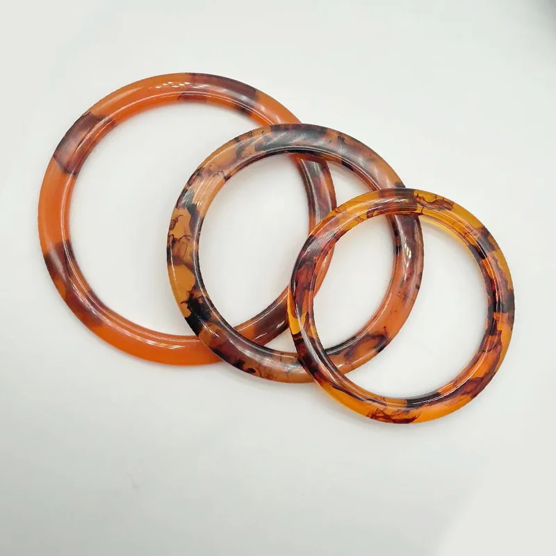 2pcs/Lot Round O-Ring Plastic Bag Handles Resin O-Shaped Handbag Handles Replacement DIY Purse Luggage Handmade Accessories 
2pcs/Lot Round O-Ring Plastic Bag Handles Resin O-Shaped Handbag Handles Replacement DIY Purse Luggage Handmade Accessories