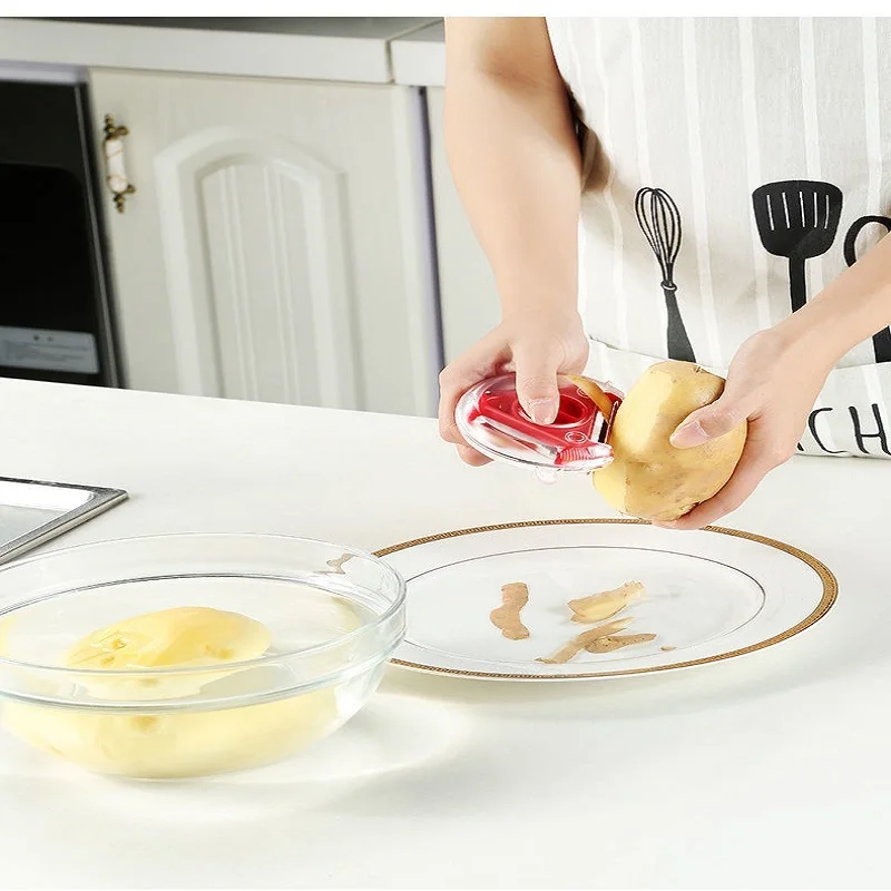 Three-in-one peeler triangle peeler multi-function vegetable cutter vegetable and fruit peeling knife vegetable cutter home gift
Three-in-one peeler triangle peeler multi-function vegetable cutter vegetable and fruit peeling knife vegetable cutter home gift