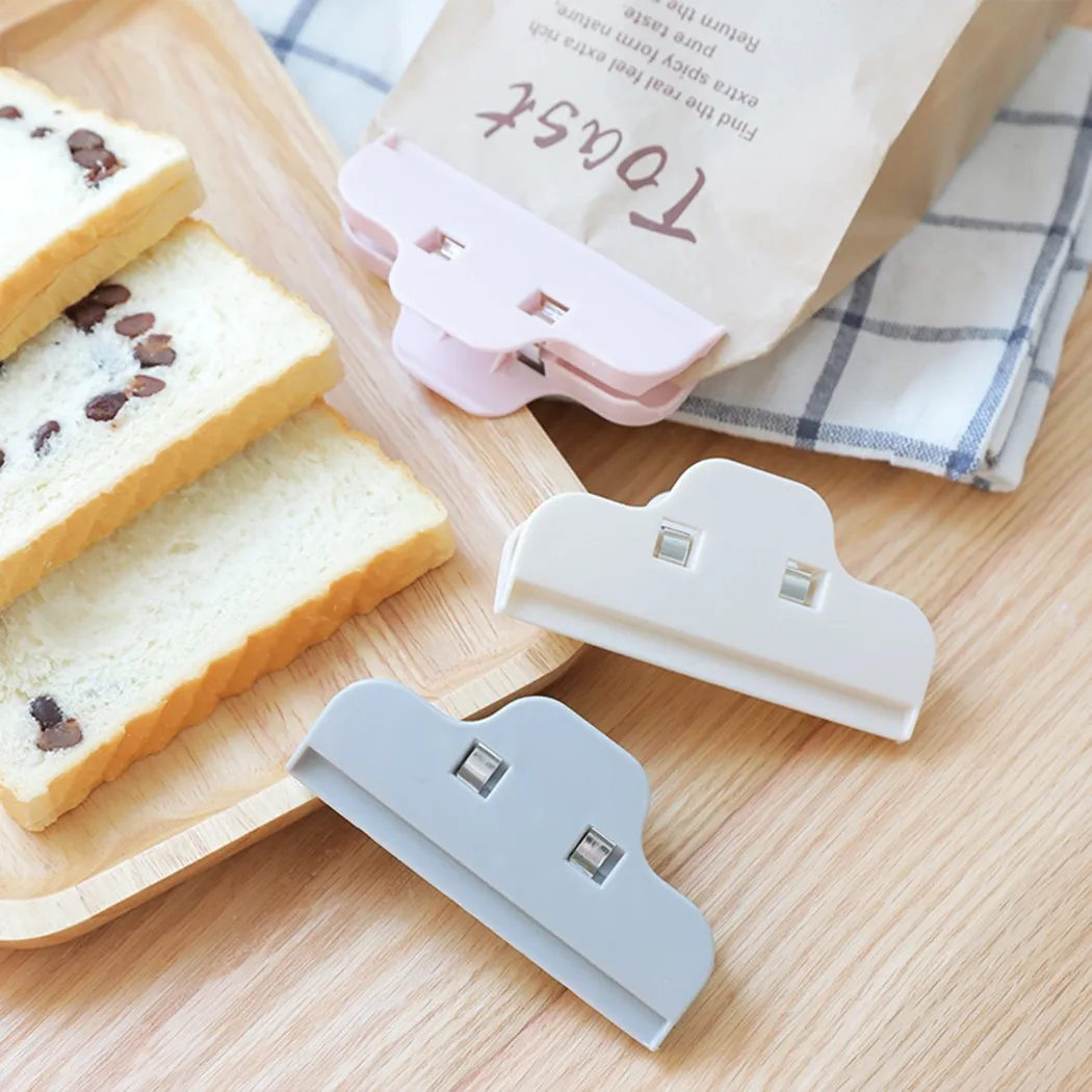 Household Food Seal Clip Portable Kitchen Storage Opening Sealer Folder Snack Seal Sealing Bag Clips Kitchen Supplies
Household Food Seal Clip Portable Kitchen Storage Opening Sealer Folder Snack Seal Sealing Bag Clips Kitchen Supplies
