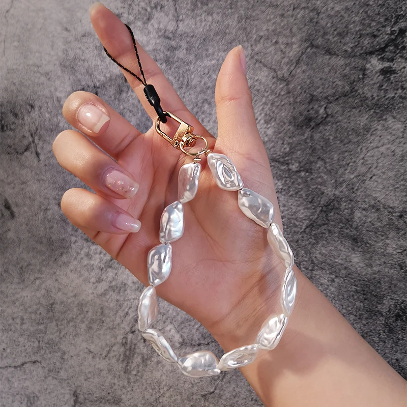 Short Wrist Chain Pearl Strap Anti-lost Pendant Mobile Phone Lanyard Women's Pendant High-end Rhinestone Pendant Phone Lanyard
Short Wrist Chain Pearl Strap Anti-lost Pendant Mobile Phone Lanyard Women's Pendant High-end Rhinestone Pendant Phone Lanyard