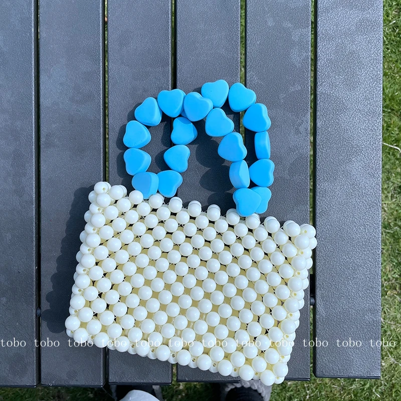 Summer Candy Color Beaded Handbag Heart Handle Handmade Clear Pearl Party Bag Fashion Cute Beach Ladies Purses Small Clutch
Summer Candy Color Beaded Handbag Heart Handle Handmade Clear Pearl Party Bag Fashion Cute Beach Ladies Purses Small Clutch
