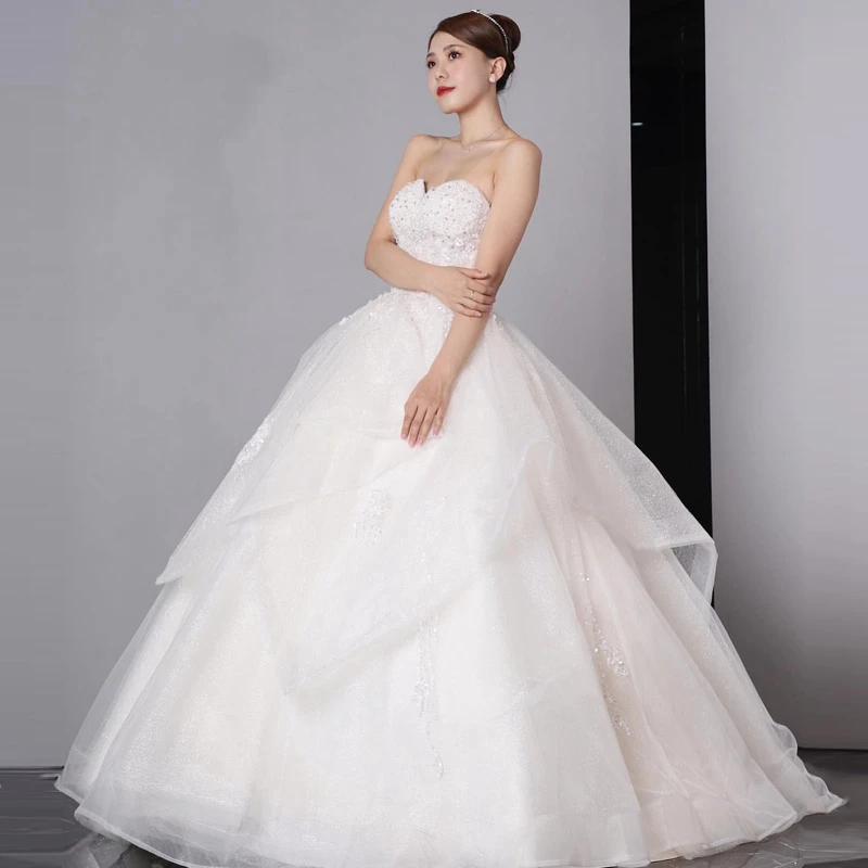 Shiny Organza Tulle Bridal Gowns Strapless A-Line Sweetheart Appliques Wedding Dress Beaded Sequins Prom Dresses robe de mariée 
Shiny Organza Tulle Bridal Gowns Strapless A-Line Sweetheart Appliques Wedding Dress Beaded Sequins Prom Dresses robe de mariée