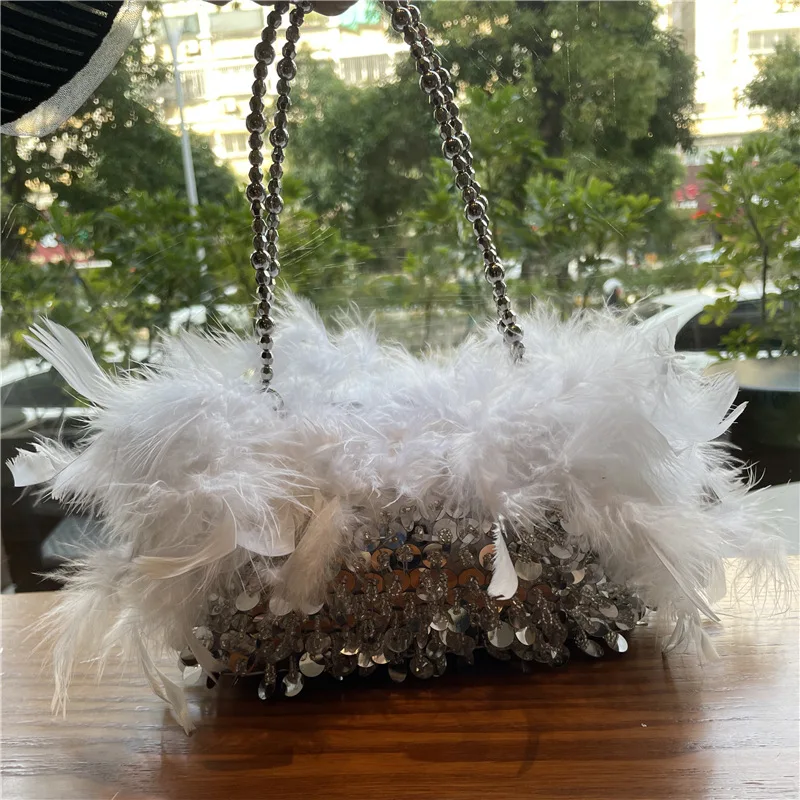 New Fashion Sequined Feather Bag Vintage Handbag Banquet Clutch Bag Blingbling Crossbody Shoulder Bag Evening Bag for Women 
New Fashion Sequined Feather Bag Vintage Handbag Banquet Clutch Bag Blingbling Crossbody Shoulder Bag Evening Bag for Women