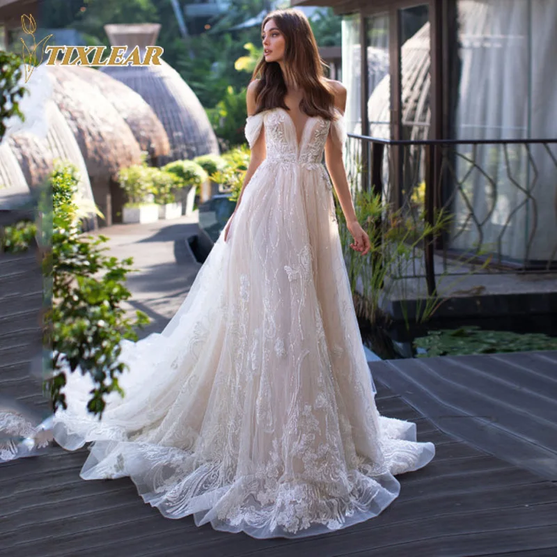 TIXLEAR Luxury Wedding Dresses V-Neck Off The Shoulder Lace Appliques Backless Bridal Gown A-Line Court Train Vestido De Novia
TIXLEAR Luxury Wedding Dresses V-Neck Off The Shoulder Lace Appliques Backless Bridal Gown A-Line Court Train Vestido De Novia