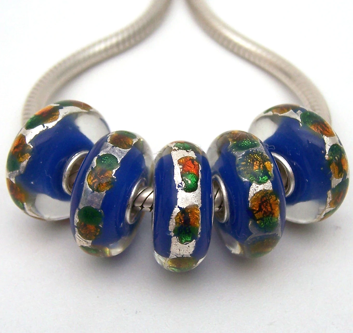 Бусины из серебра 100% пробы с муранским стеклом
Бусины из серебра 100% пробы с муранским стеклом