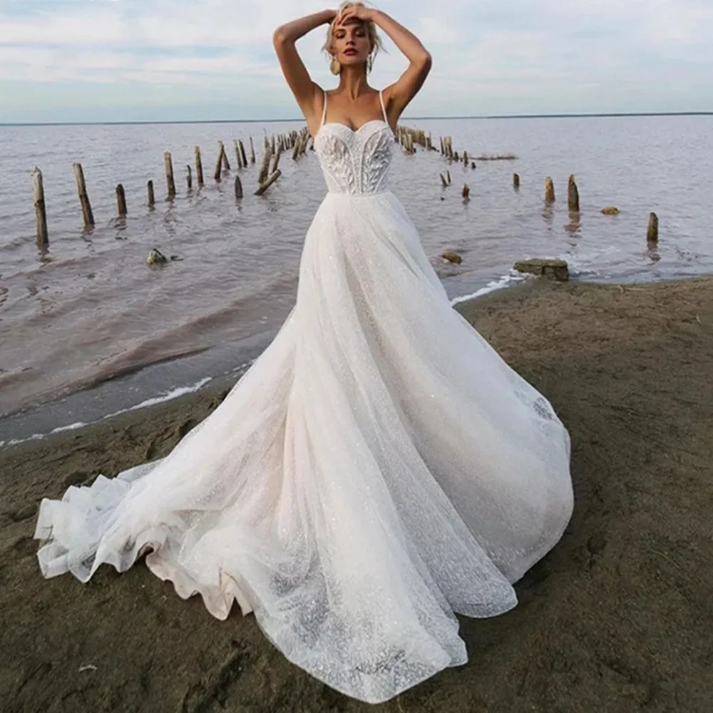 Shiny Spaghetti Strap Wedding Dress Lace Appliques Sequins Tulle Vestido De Noiva Sleeveless A Line Bridal Gown свадебное платье
Shiny Spaghetti Strap Wedding Dress Lace Appliques Sequins Tulle Vestido De Noiva Sleeveless A Line Bridal Gown свадебное платье