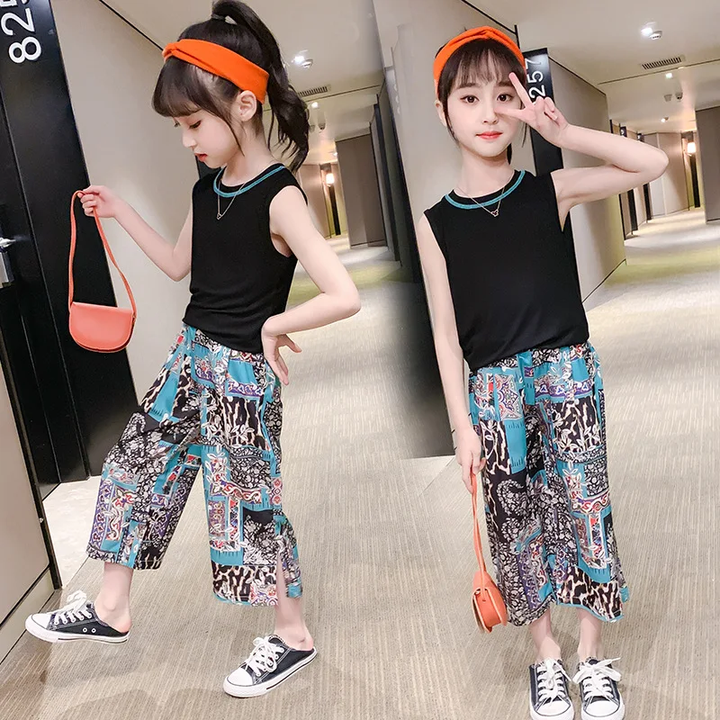 Children 2022 New Clothing Girls Black Sleeveless T-shirt Vest + Totem Pattern Wide Leg Pants 2pcs Set Teenage Casual Sport Suit
Children 2022 New Clothing Girls Black Sleeveless T-shirt Vest + Totem Pattern Wide Leg Pants 2pcs Set Teenage Casual Sport Suit
