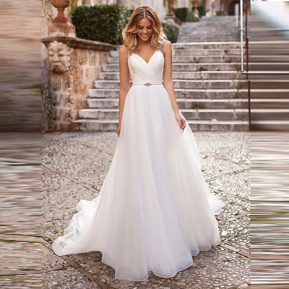 TulleSpaghetti Straps Backless Wedding Dresses with Rhinestones Crystals Robe de Mariee Bride Dress 2022 V Neck Custom Made Robe
TulleSpaghetti Straps Backless Wedding Dresses with Rhinestones Crystals Robe de Mariee Bride Dress 2022 V Neck Custom Made Robe