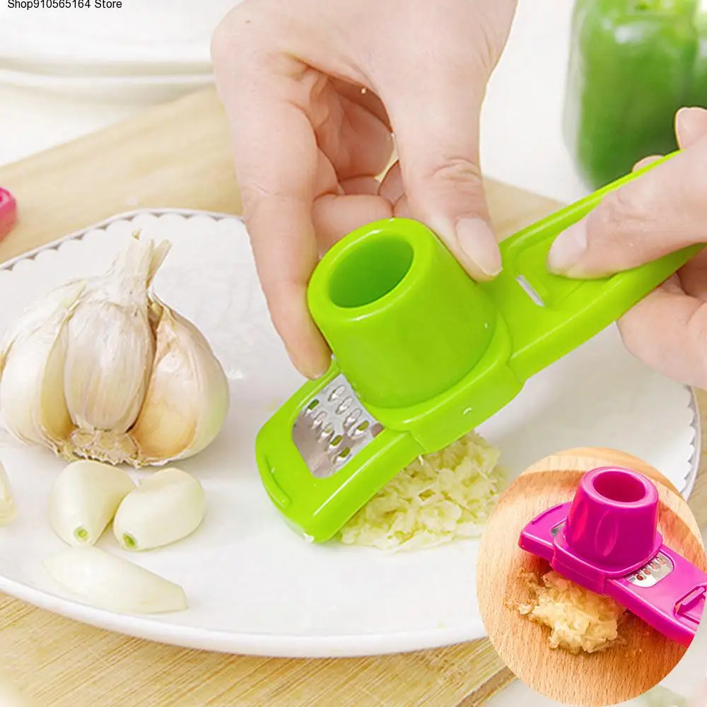 Multifunction Stainless Steel Pressing ABS Garlic Press Peeler Grater Garlic Grinding Planer Chopper Kitchen Tool 
Multifunction Stainless Steel Pressing ABS Garlic Press Peeler Grater Garlic Grinding Planer Chopper Kitchen Tool