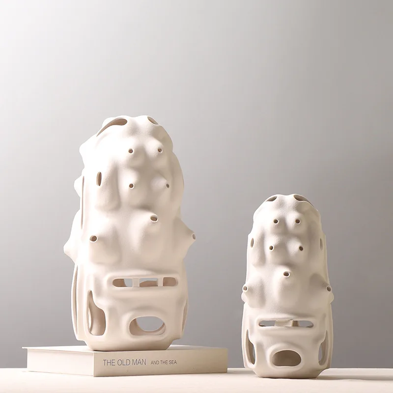 Creative Ceramic Handicraft Ornaments Hollow Out Coral Handmade Raised Irregular Flower Arrangement Vase Home Decoration
Creative Ceramic Handicraft Ornaments Hollow Out Coral Handmade Raised Irregular Flower Arrangement Vase Home Decoration