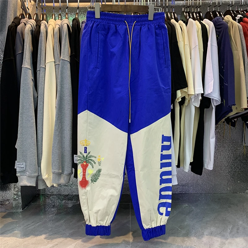 High Street Rhude Pants Men Women Loose Drawstring Overalls Patchwork Sweatpants
High Street Rhude Pants Men Women Loose Drawstring Overalls Patchwork Sweatpants