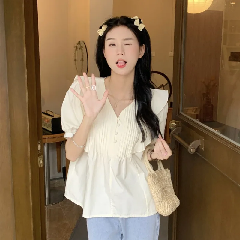 Apricot V-neck bubble sleeve shirt women's summer 2022 new design sense niche French sweet Ruffle Top
Apricot V-neck bubble sleeve shirt women's summer 2022 new design sense niche French sweet Ruffle Top