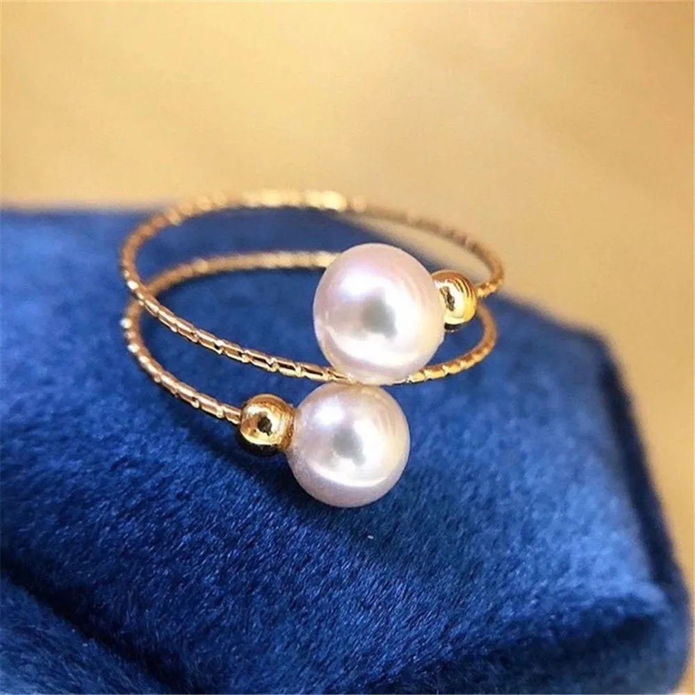 Exclusive new 14K gold injection fashion stretch double bead ring Extremely simple style 6-7 natural high quality pearls
Exclusive new 14K gold injection fashion stretch double bead ring Extremely simple style 6-7 natural high quality pearls