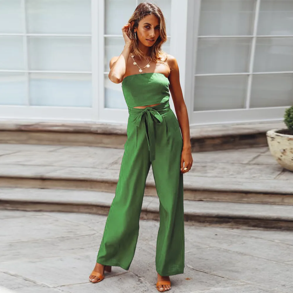 Casual Strappy Jumpsuits Women Summer Tube Top Straight Leg Wide Pants Solid Lace Up Backless Stitching Sexy Overalls Playsuit
Casual Strappy Jumpsuits Women Summer Tube Top Straight Leg Wide Pants Solid Lace Up Backless Stitching Sexy Overalls Playsuit