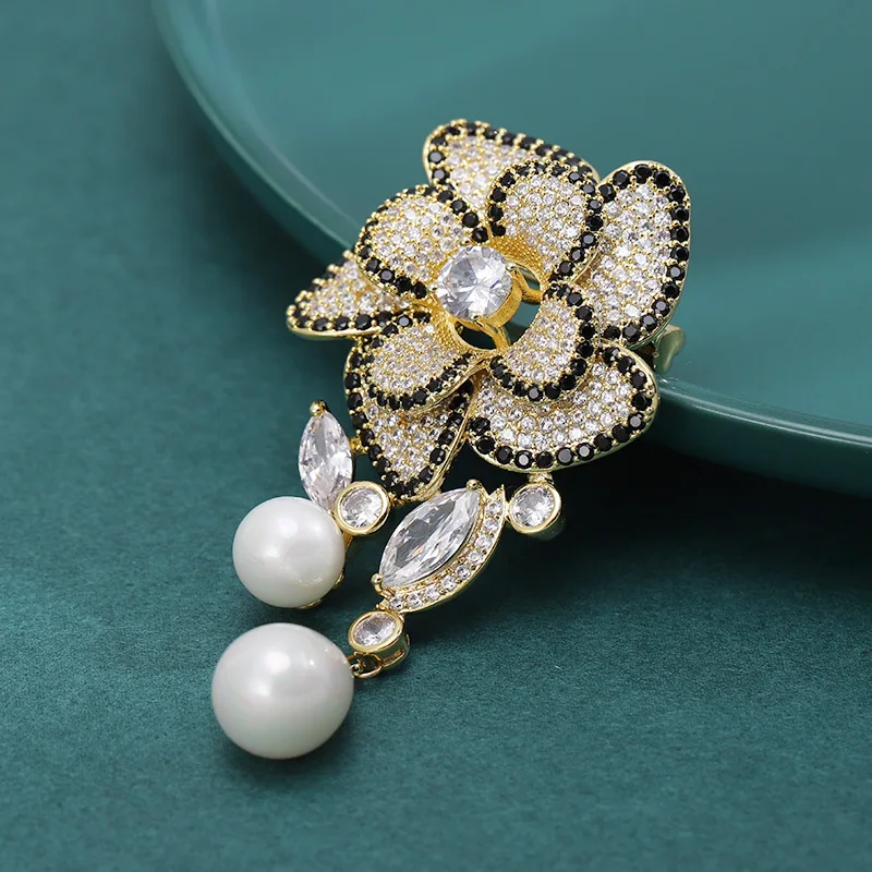 New luxury high-end heavy industry elegant gold-plated zircon camellia brooch pearl tassel brooch suit accessory pin female
New luxury high-end heavy industry elegant gold-plated zircon camellia brooch pearl tassel brooch suit accessory pin female