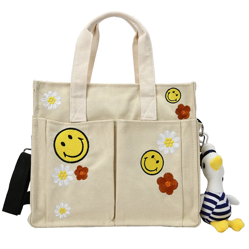 202598 Large Capacity Canvas Handbag Female Tide Brand Cartoon Embroidery New Tide Ins Messenger Bag College Student Class Tote
202598 Large Capacity Canvas Handbag Female Tide Brand Cartoon Embroidery New Tide Ins Messenger Bag College Student Class Tote