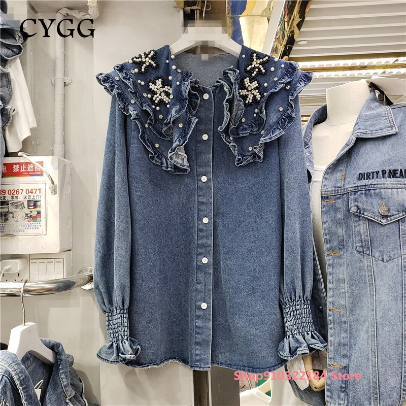 2022 New European Goods Heavy Industry Beaded Denim Doll Collar Stitching Shirt Women's Spring and Autumn Long-Sleeved Top
2022 New European Goods Heavy Industry Beaded Denim Doll Collar Stitching Shirt Women's Spring and Autumn Long-Sleeved Top