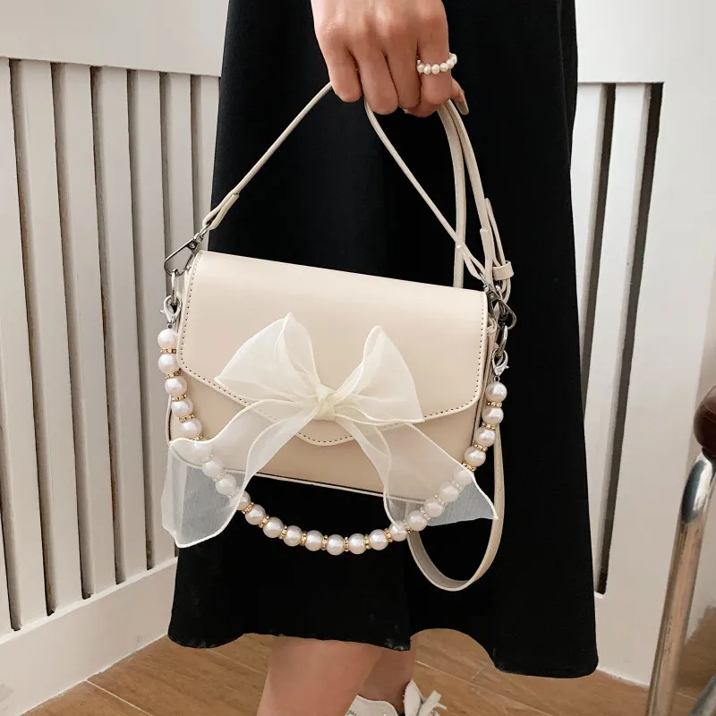 Pearl Chain Crossbody Bags for Women Luxury Pu Leather Shoulder Bag Small Flap Messenger Bag Ladies Solid Color Simple Handbags
Pearl Chain Crossbody Bags for Women Luxury Pu Leather Shoulder Bag Small Flap Messenger Bag Ladies Solid Color Simple Handbags