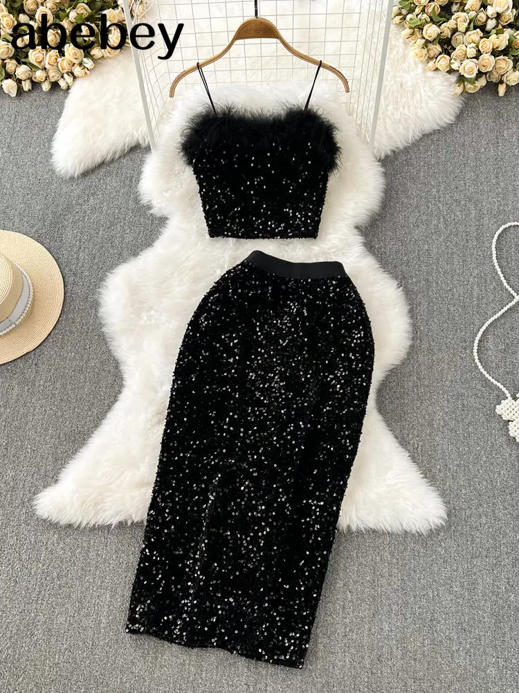 Зимний сексуальный комплект из двух предметов с блестками, Женский блестящий топ без рукавов с открытой спиной и юбка миди, женский модный костюм 
Зимний сексуальный комплект из двух предметов с блестками, Женский блестящий топ без рукавов с открытой спиной и юбка миди, женский модный костюм