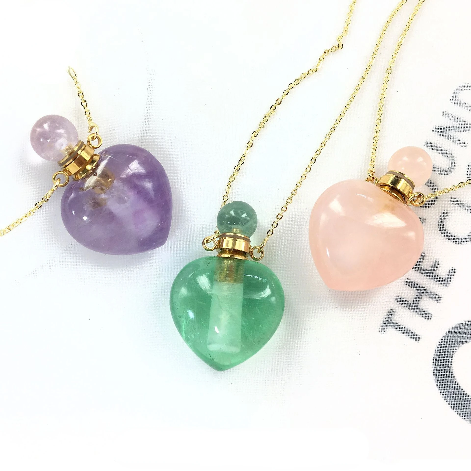 1pc Natural Amethysts Rose Quartz Perfume Bottle Pendant Healing Crystal Essential Oils Diffuser Reiki Stone Necklace for Women
1pc Natural Amethysts Rose Quartz Perfume Bottle Pendant Healing Crystal Essential Oils Diffuser Reiki Stone Necklace for Women