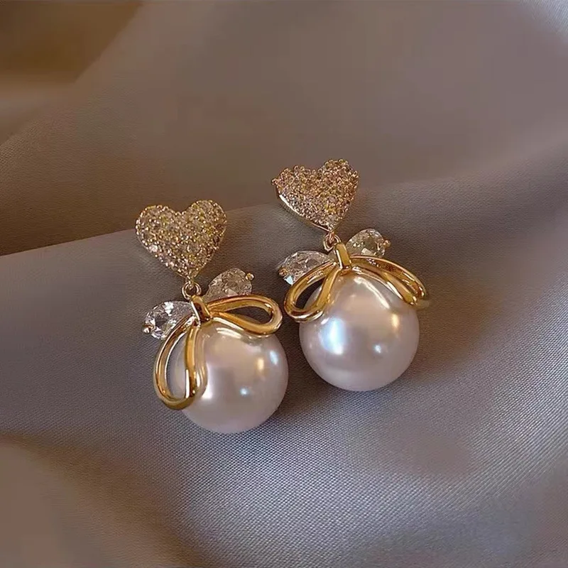 Elegant Simulated-pearl Bowknot Love Heart Drop Earrings Korean Temperament Geometric White Pearl Beads Wedding Earrings Jewelry
Elegant Simulated-pearl Bowknot Love Heart Drop Earrings Korean Temperament Geometric White Pearl Beads Wedding Earrings Jewelry