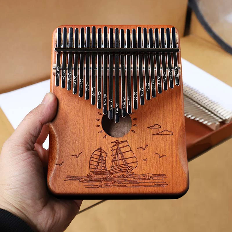 Upgraded 21 Keys Kalimba Thumb Piano Mahogany Body Solid Wood Veneer Pronunciation Box with Tuning Hammer Sticker All in One Kit
Upgraded 21 Keys Kalimba Thumb Piano Mahogany Body Solid Wood Veneer Pronunciation Box with Tuning Hammer Sticker All in One Kit