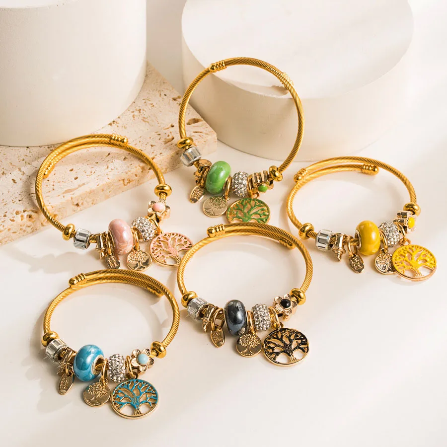 Golden Stainless Steel Charm Banglets for Girls Tree of Life Lucky Hanging Bracelets Jewelry Suitable for Holiday Gifts
Golden Stainless Steel Charm Banglets for Girls Tree of Life Lucky Hanging Bracelets Jewelry Suitable for Holiday Gifts
