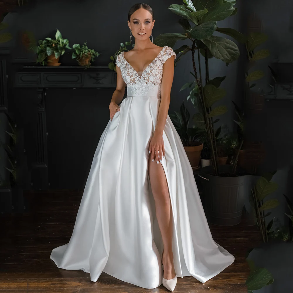 Classic V-Neck Satin Wedding Dresses Lace Appliques A-Line Cap Sleeve Bridal Gowns Open Back Sweep Train Plain Vestidos De Novia
Classic V-Neck Satin Wedding Dresses Lace Appliques A-Line Cap Sleeve Bridal Gowns Open Back Sweep Train Plain Vestidos De Novia